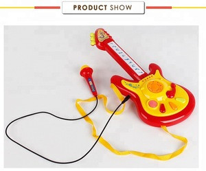 toy guitar with strap