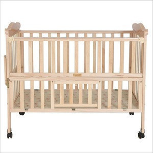 wooden cot bed