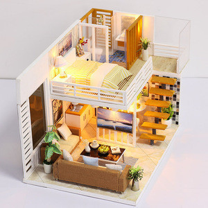 small wooden doll house